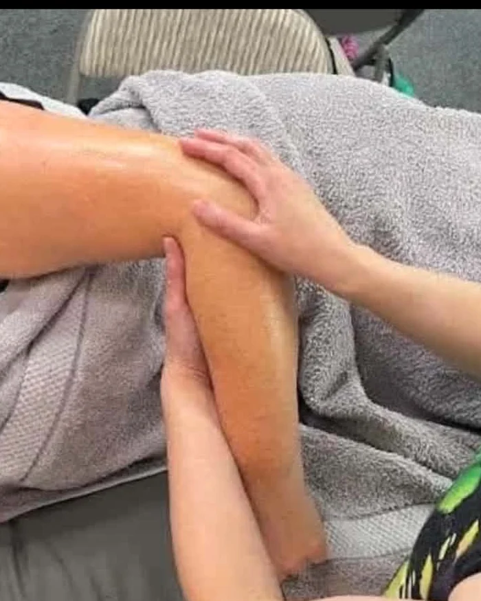 A gentle hands-on massage — calm, hands-on care during a therapy session