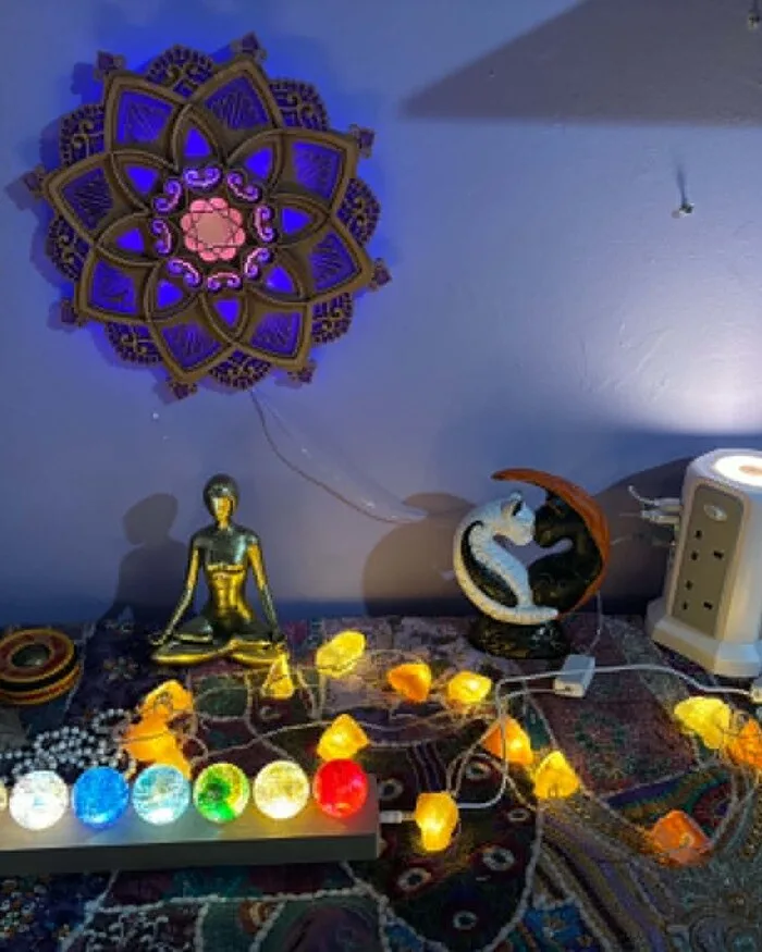 A warm, calming therapy room with soft lighting and gentle décor